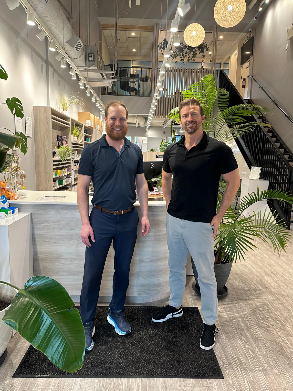 Chris and James inside Kiwi Pharmacy & Wellness